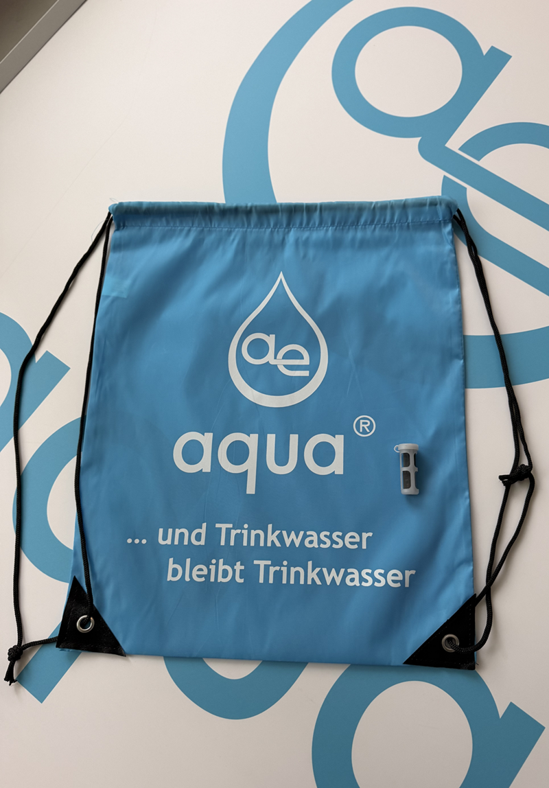 Messe-Geschenk: ae-aqua Beutel & 1x Trinksystem Kapsel